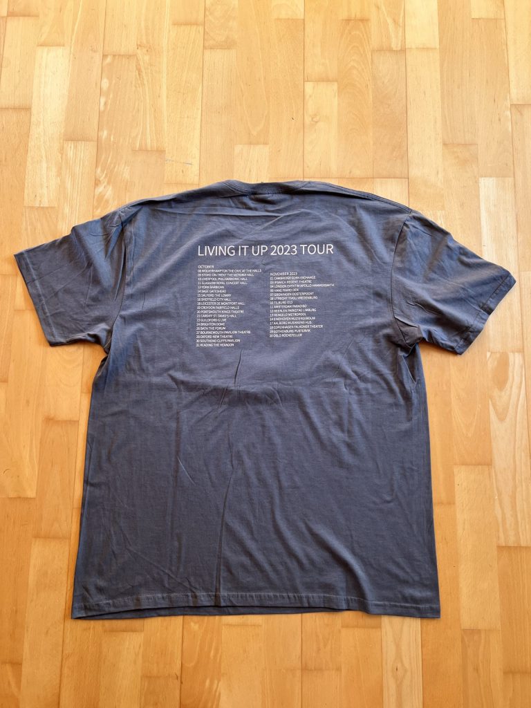 Grey Living it up Tour T-shirt with dates on the back